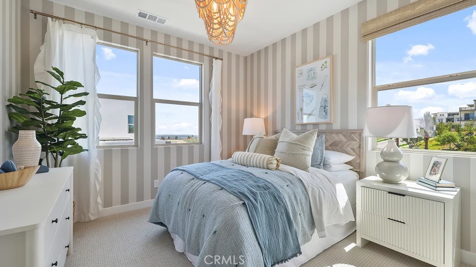 925 Walnut Terrace Montebello, CA 90640 - Photo 22 of 33 a bedroom with a large bed and a window