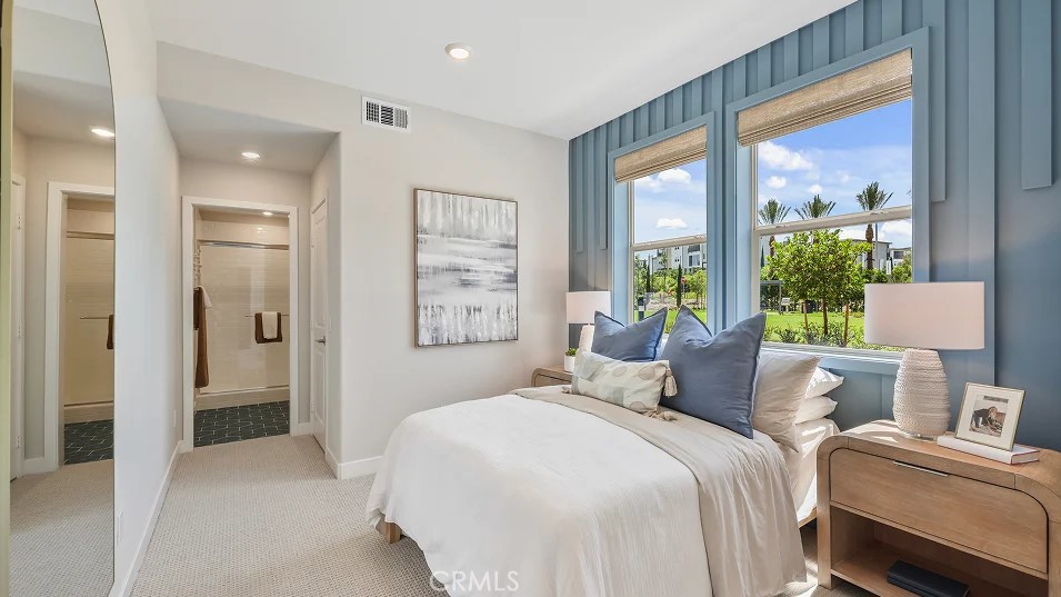 925 Walnut Terrace Montebello, CA 90640 - Photo 24 of 33 a bedroom with a large bed and a window