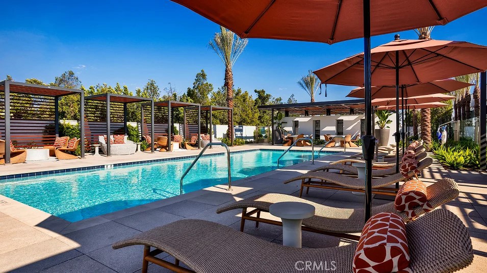 925 Walnut Terrace Montebello, CA 90640 - Photo 29 of 33 a view of a patio with a table and chairs under an umbrella