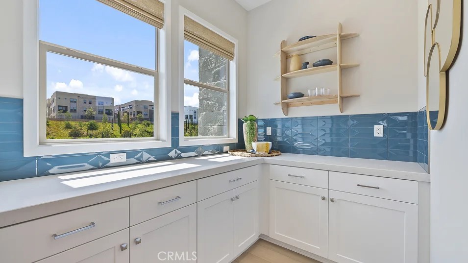 925 Walnut Terrace Montebello, CA 90640 - Photo 5 of 33 a white kitchen with sink and window