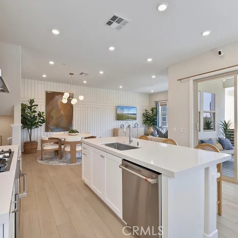 925 Walnut Terrace Montebello, CA 90640 - Photo 6 of 33 a kitchen with sink and view living room