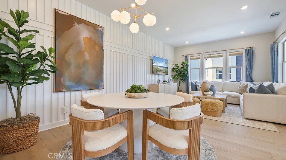 925 Walnut Terrace Montebello, CA 90640 - Photo 7 of 33 a view of a dining room with furniture and a potted plant