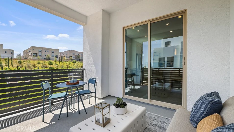 925 Walnut Terrace Montebello, CA 90640 - Photo 9 of 33 a living room with furniture and a floor to ceiling window