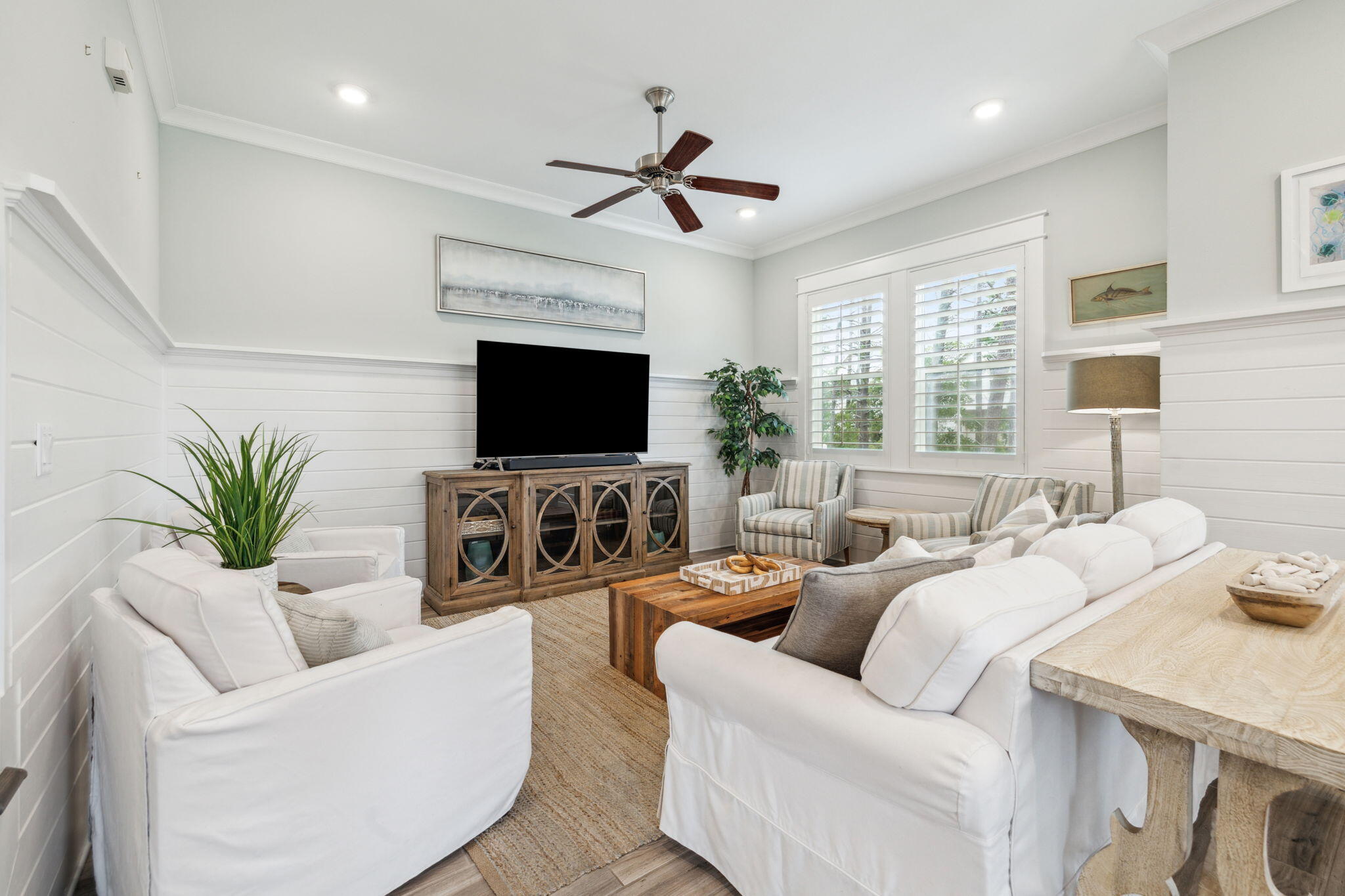 25 Pine Lands Loop East, Unit B Inlet Beach, FL 32461 - Photo 12 of 37 a living room with furniture a fireplace and a flat screen tv