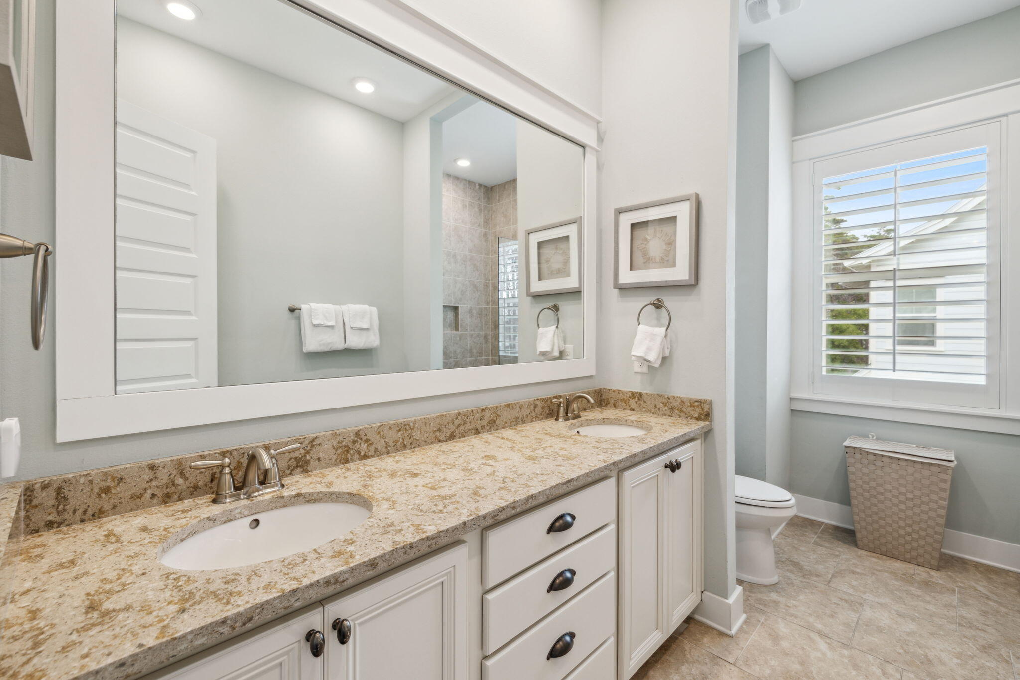 25 Pine Lands Loop East, Unit B Inlet Beach, FL 32461 - Photo 17 of 37 a bathroom with a granite countertop double vanity sink a mirror and a