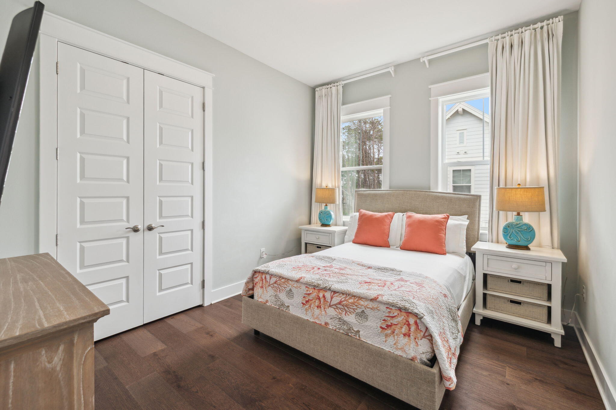 25 Pine Lands Loop East, Unit B Inlet Beach, FL 32461 - Photo 19 of 37 a bedroom with a bed and a window