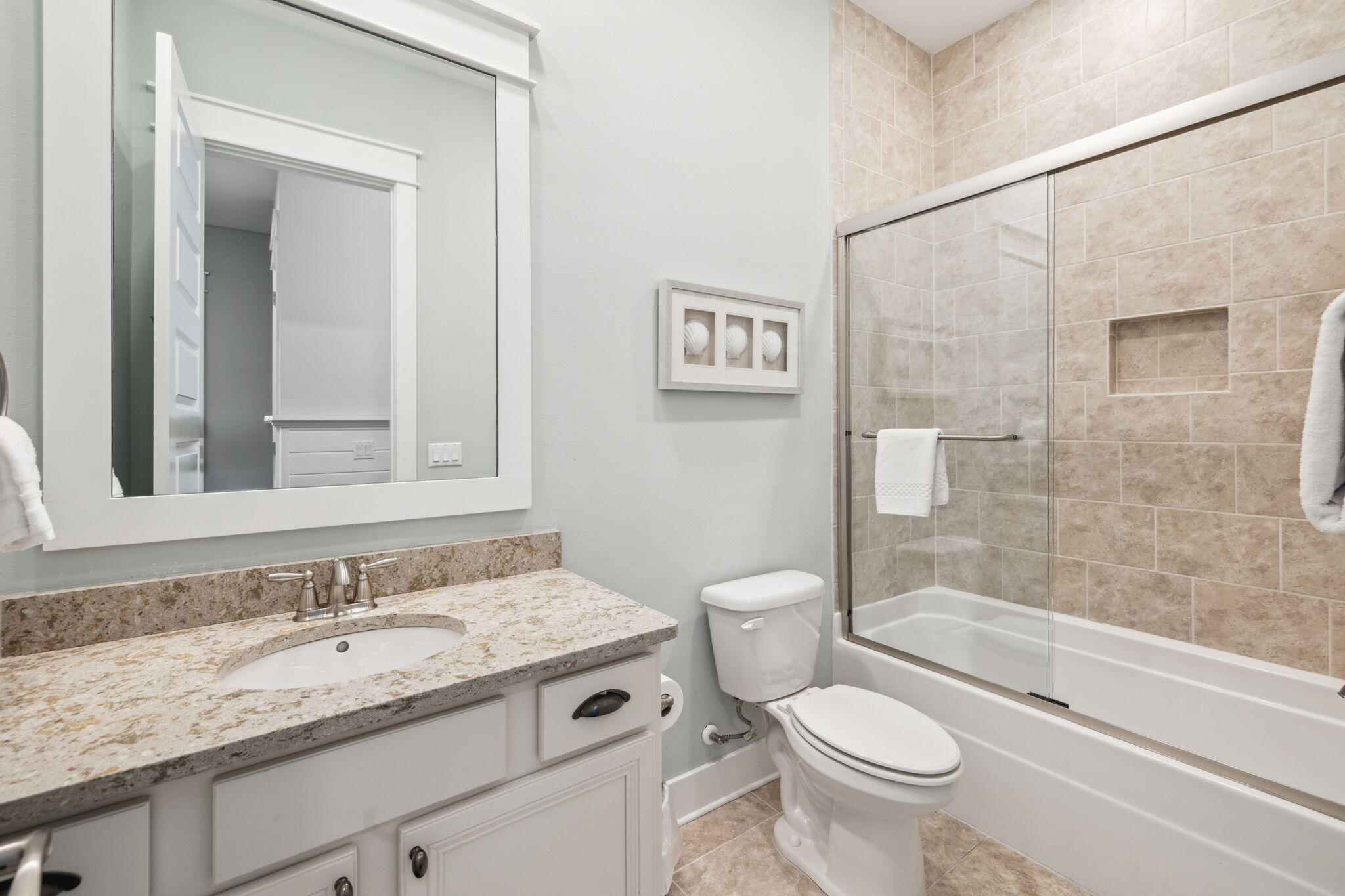 25 Pine Lands Loop East, Unit B Inlet Beach, FL 32461 - Photo 21 of 37 a bathroom with a granite countertop sink a toilet and shower