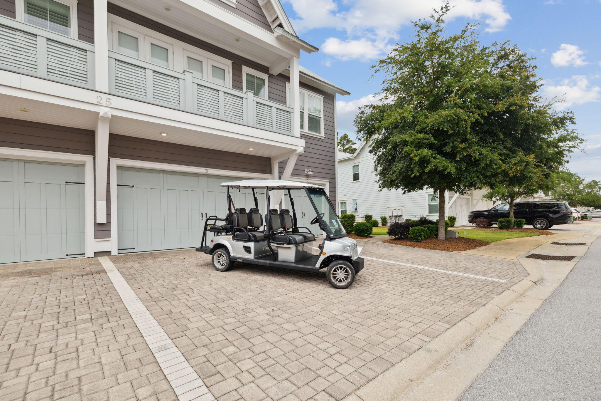 25 Pine Lands Loop East, Unit B Inlet Beach, FL 32461 - Photo 30 of 37 a car parked on the side of a street