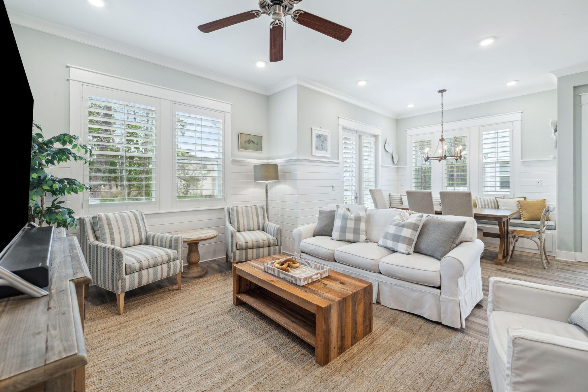 25 Pine Lands Loop East, Unit B Inlet Beach, FL 32461 - Photo 3 of 37 a living room with furniture and a large window