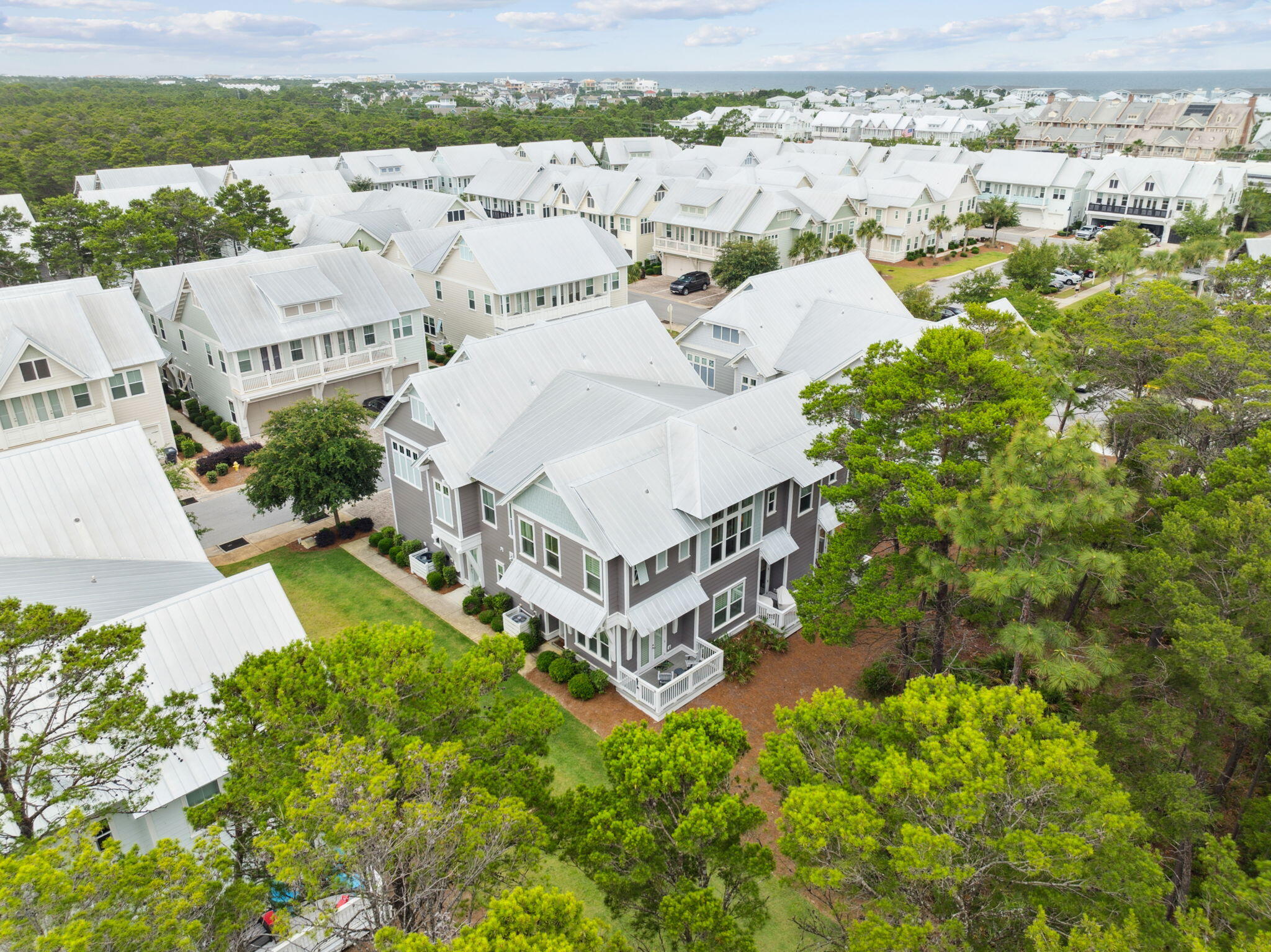 25 Pine Lands Loop East, Unit B Inlet Beach, FL 32461 - Photo 35 of 37 an aerial view of residential house with outdoor space and trees all around