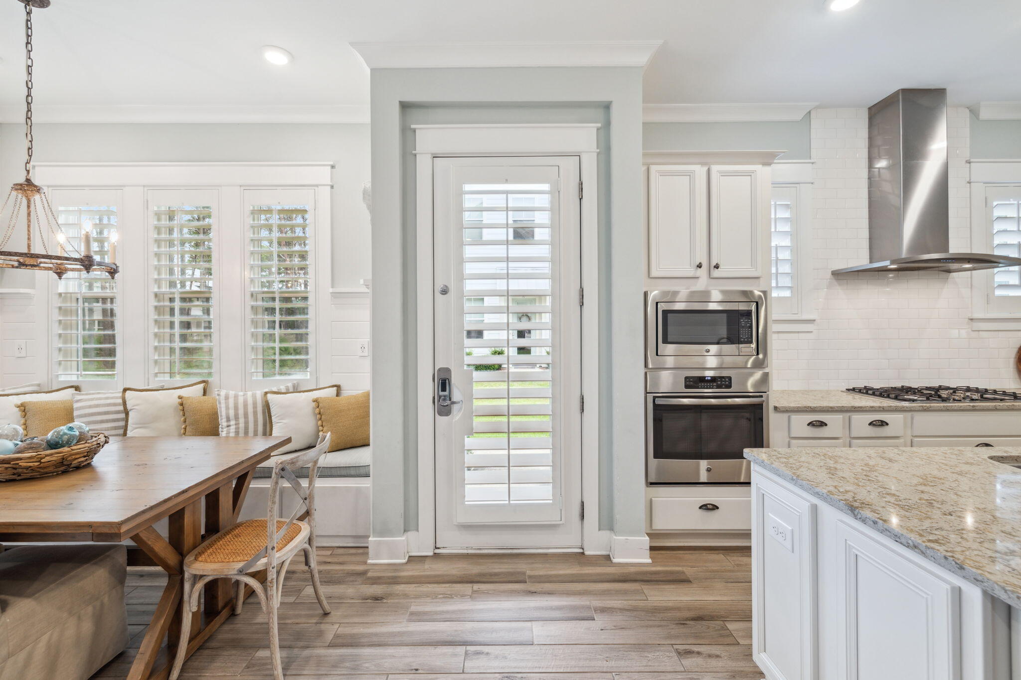 25 Pine Lands Loop East, Unit B Inlet Beach, FL 32461 - Photo 4 of 37 a kitchen with stainless steel appliances granite countertop a stove refrigerator sink and cabinets