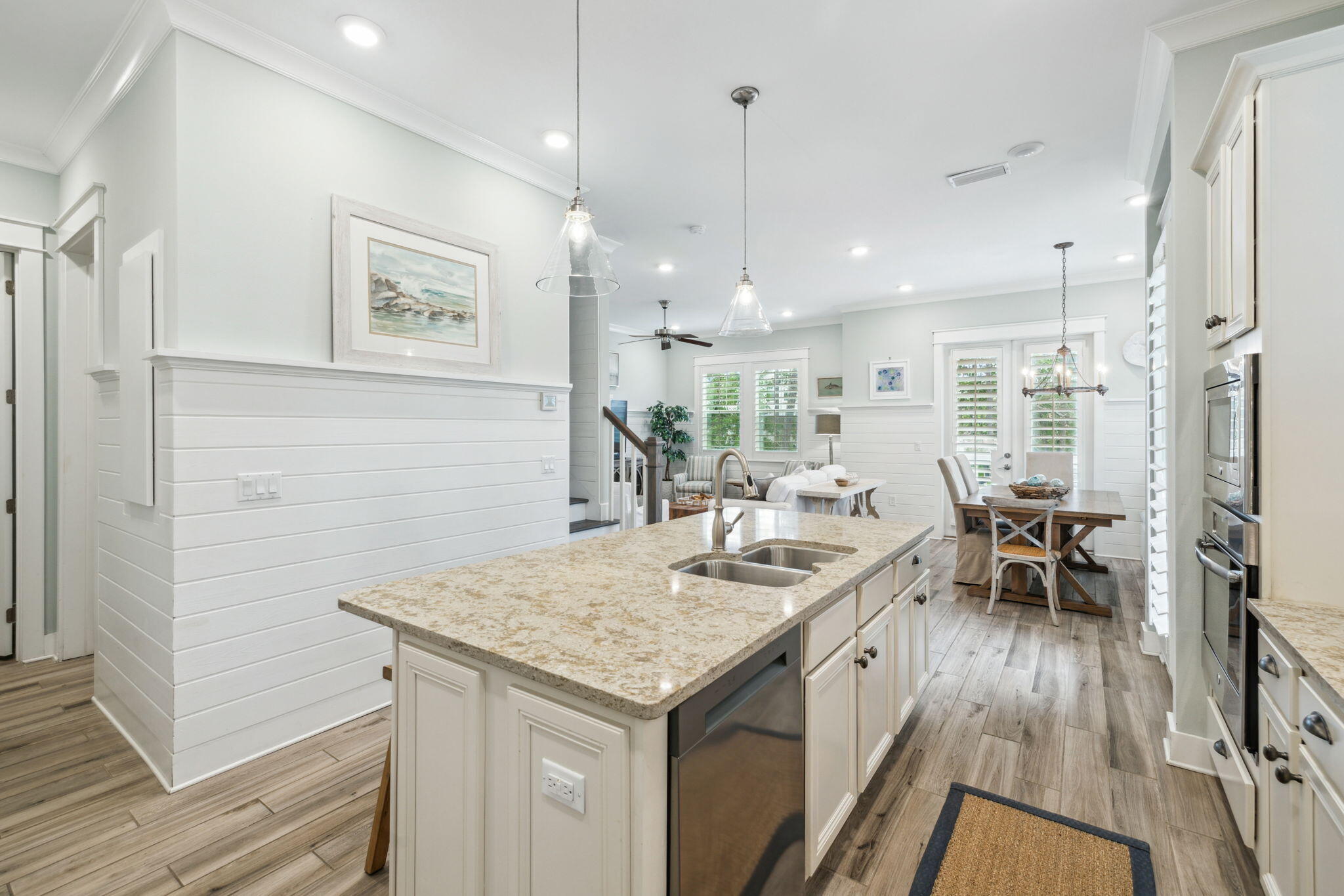 25 Pine Lands Loop East, Unit B Inlet Beach, FL 32461 - Photo 7 of 37 a kitchen with a table chairs refrigerator and microwave