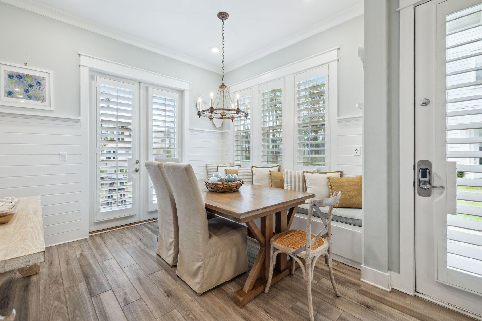 25 Pine Lands Loop East, Unit B Inlet Beach, FL 32461 - Photo 10 of 37 a view of a dining room with furniture window and wooden floor