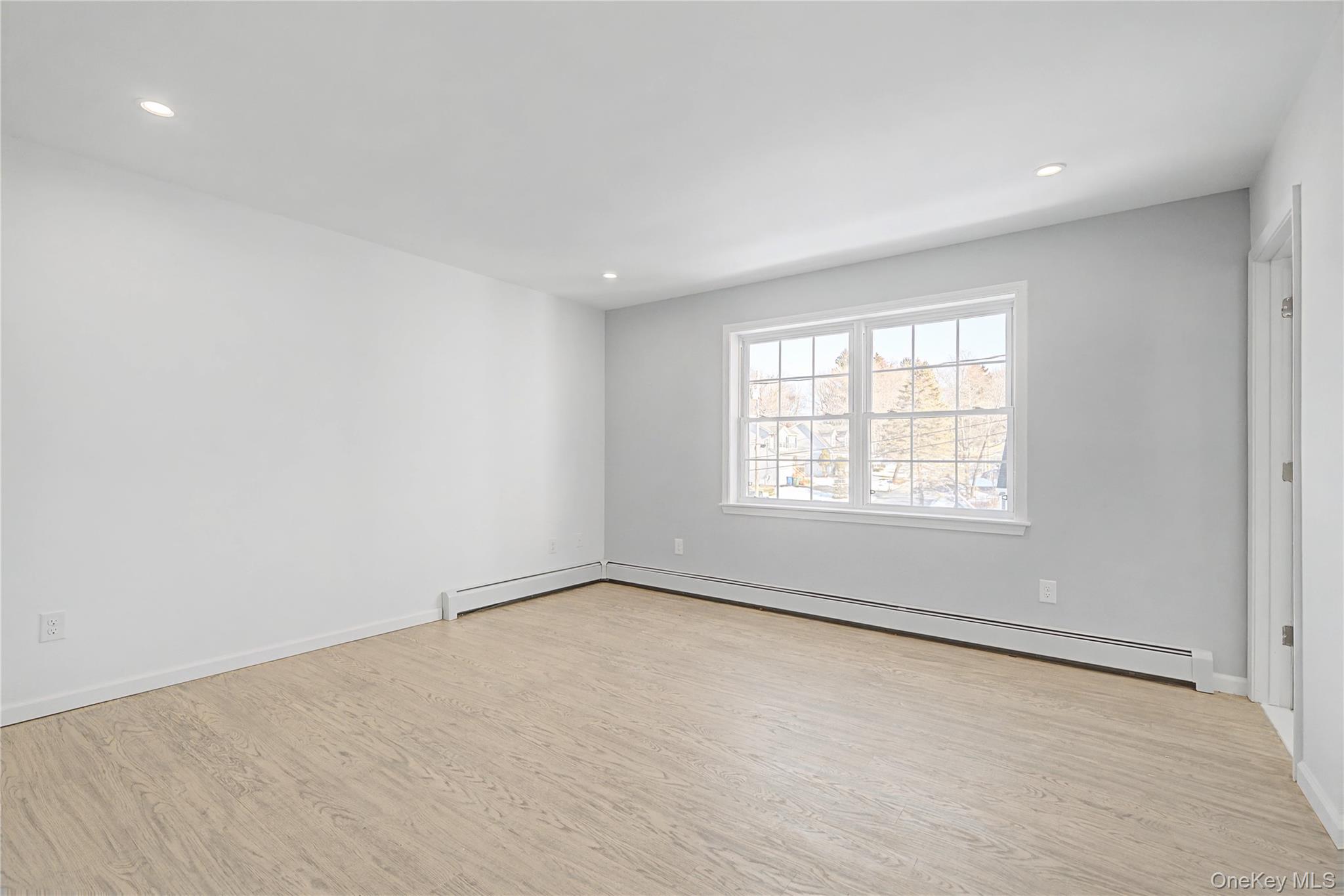 25 Clinton Street Middletown, NY 10940 - Photo 18 of 38 an empty room with a window