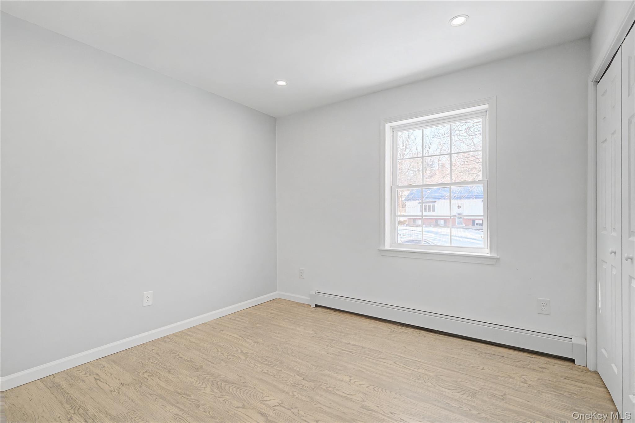 25 Clinton Street Middletown, NY 10940 - Photo 22 of 38 an empty room with a window