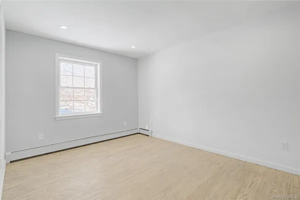 a view of a balcony with table and chairs