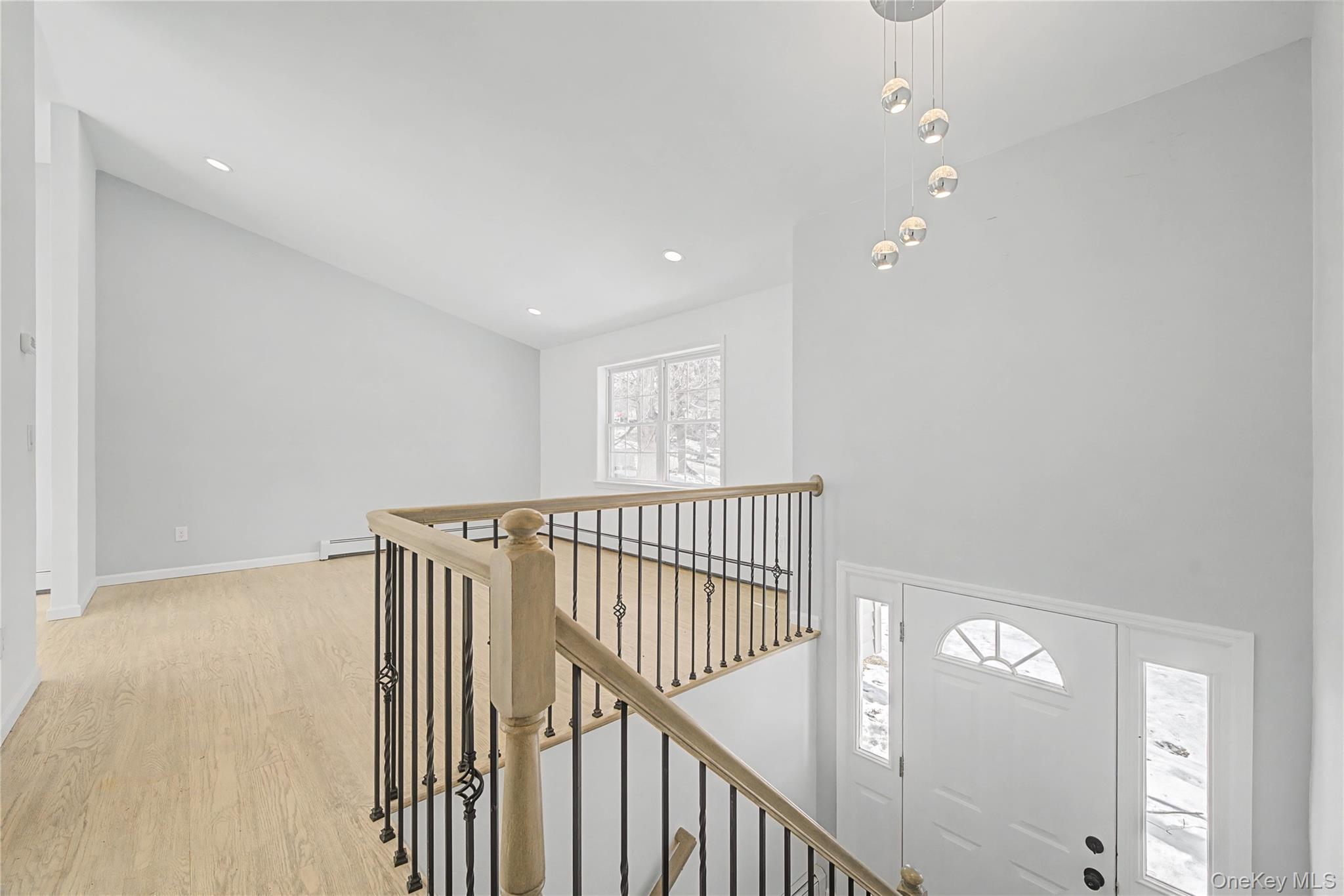 25 Clinton Street Middletown, NY 10940 - Photo 6 of 38 a view of staircase with railing and white walls