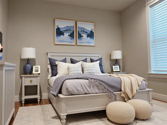 a bed room with a bed and a chair