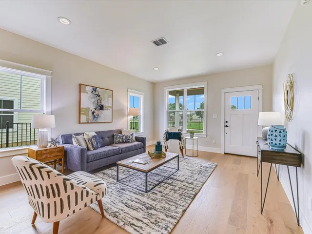 a living room with furniture and a couch