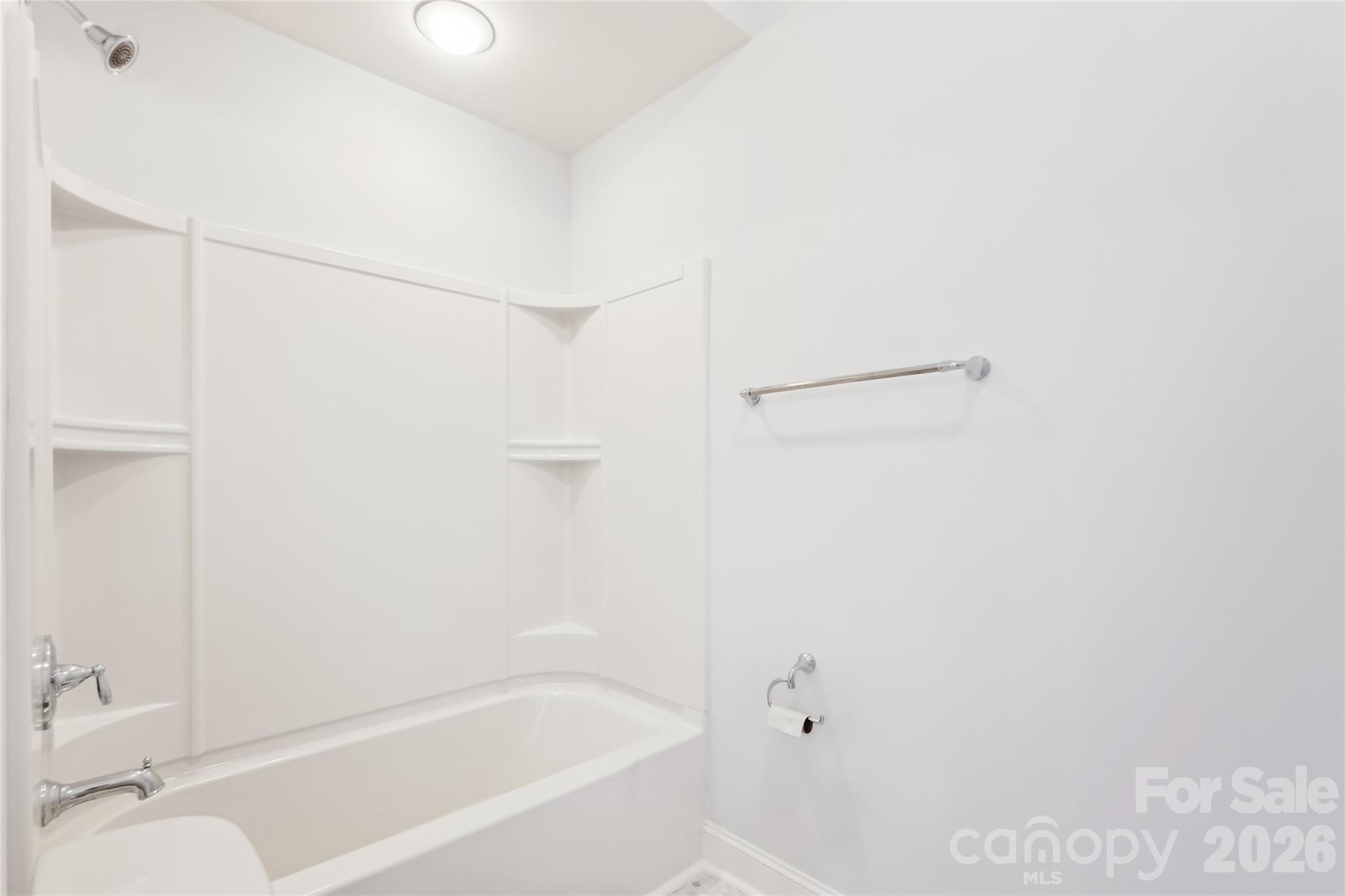 657 Chase Court Fort Mill, SC 29708 - Photo 32 of 39 a bathroom with a bathtub