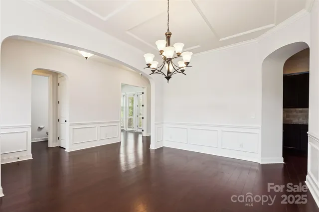 a view of a livingroom with wooden floor