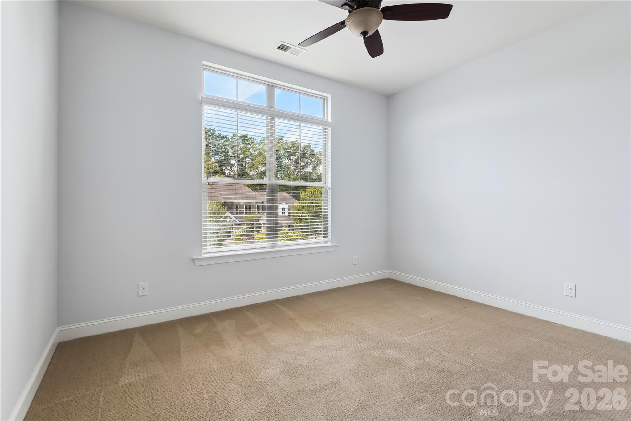 657 Chase Court Fort Mill, SC 29708 - Photo 7 of 39 an empty room with a window
