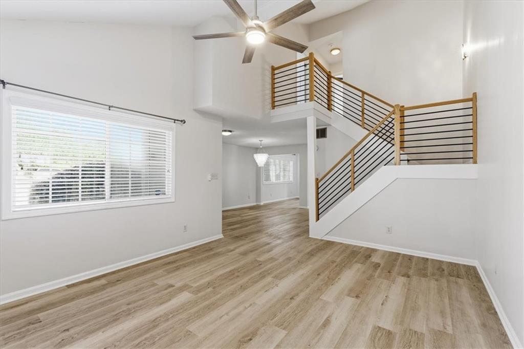 1468 Briarwood Road Northeast, Unit 303 Brookhaven, GA 30319 - Photo 12 of 32 a view of entryway and hall with wooden floor
