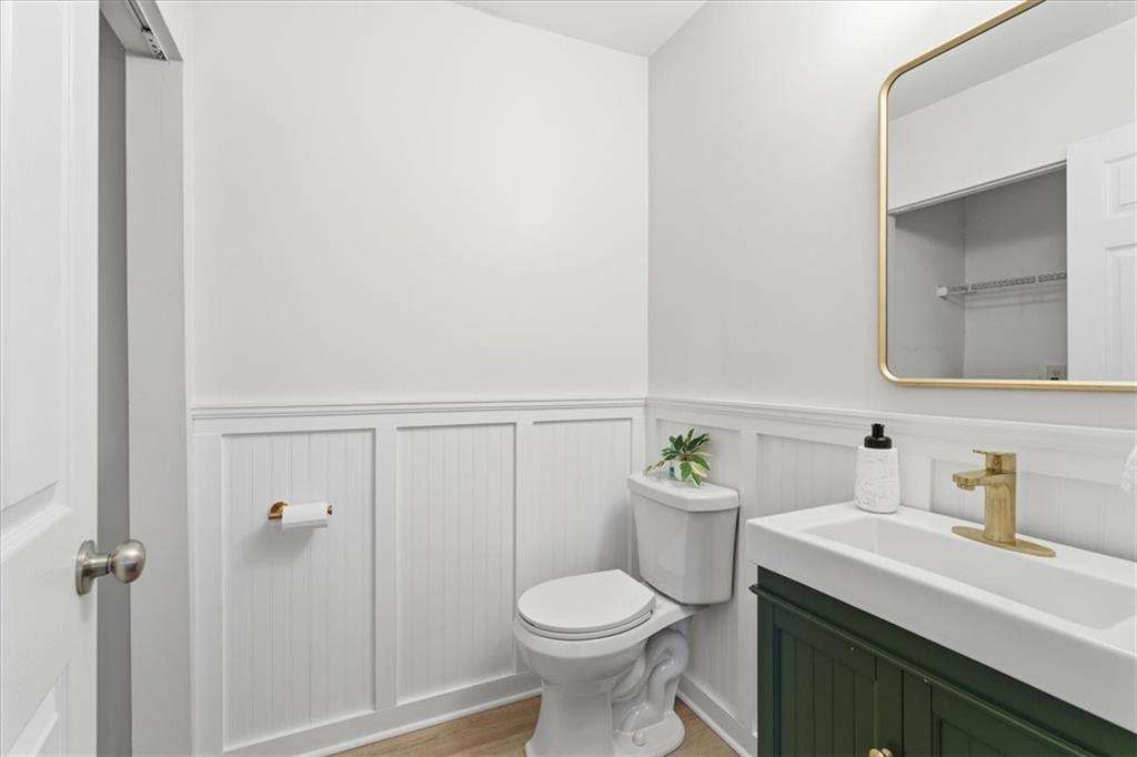 1468 Briarwood Road Northeast, Unit 303 Brookhaven, GA 30319 - Photo 8 of 32 a bathroom with a sink a toilet and shower