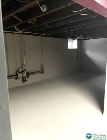 a bathroom with a sink a mirror and shower