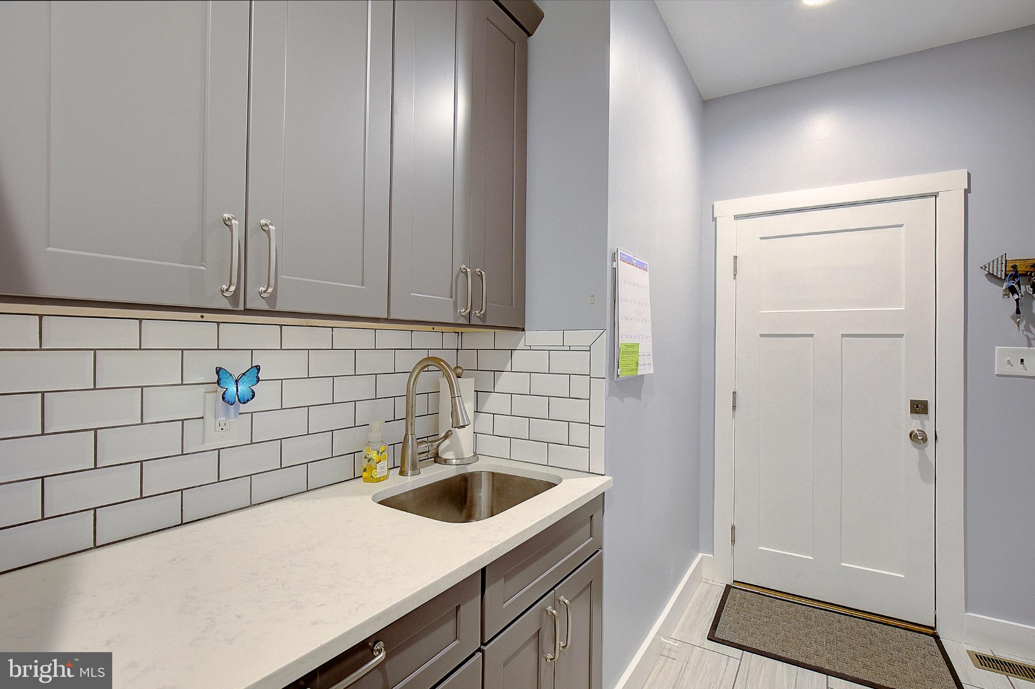 3081 Soper Road Huntingtown, MD 20639 - Photo 23 of 49 Charming kitchen with modern accents.