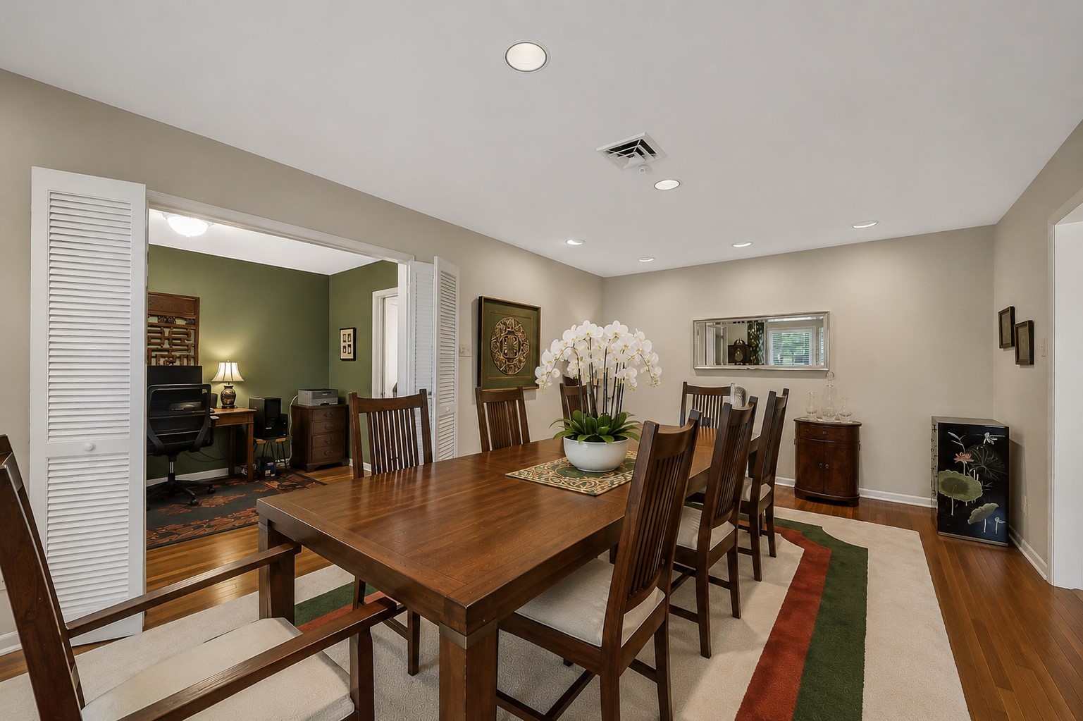5626 Hummingbird Street Houston, TX 77096 - Photo 6 of 34 VIRTUALLY STAGED. Another view of the formal dining room. This photo currently shows seating for 8 and still there is room to expand the table seating, if needed. There is plenty of wall space also for accompanying furnishings such as a buffet, china cabinet, or decorative mirrors/artwork.