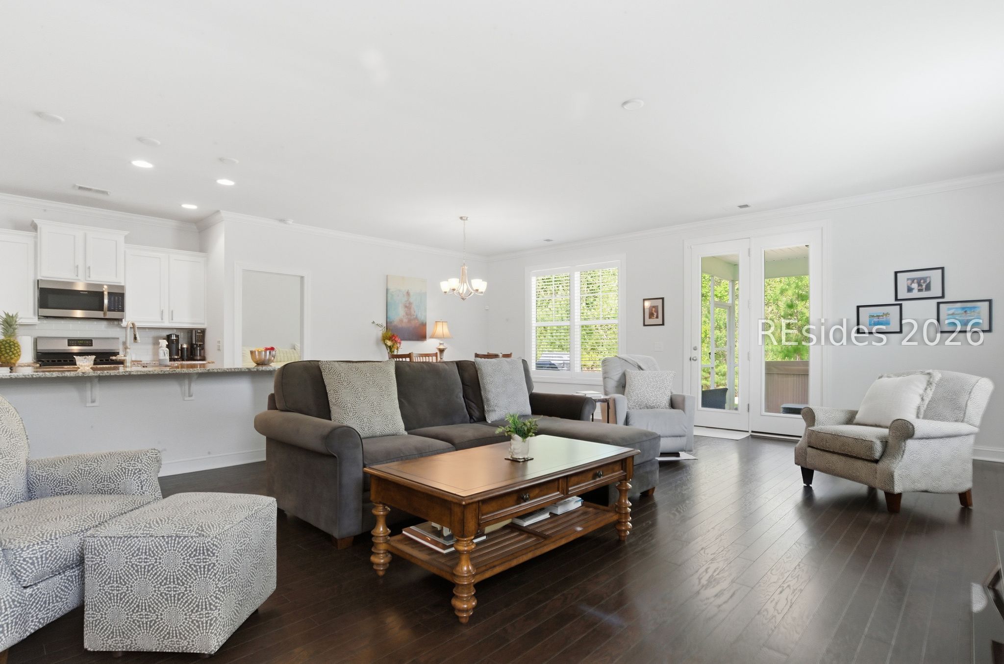 246 Lombards Mill Lane Bluffton, SC 29909 - Photo 16 of 33 Living room and dining area easily access porch.