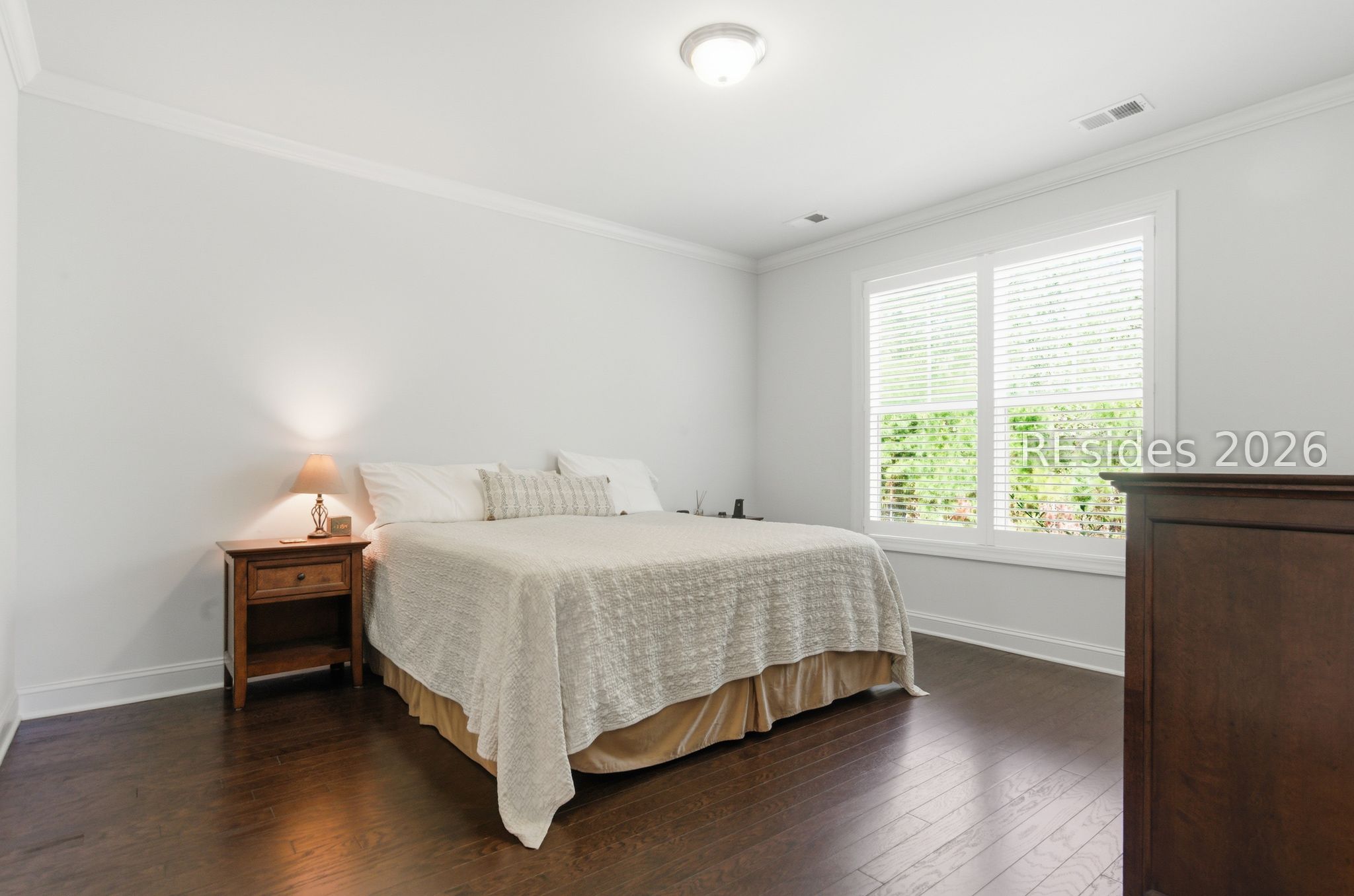 246 Lombards Mill Lane Bluffton, SC 29909 - Photo 17 of 33 Large primary bedroom with plantation shutters.