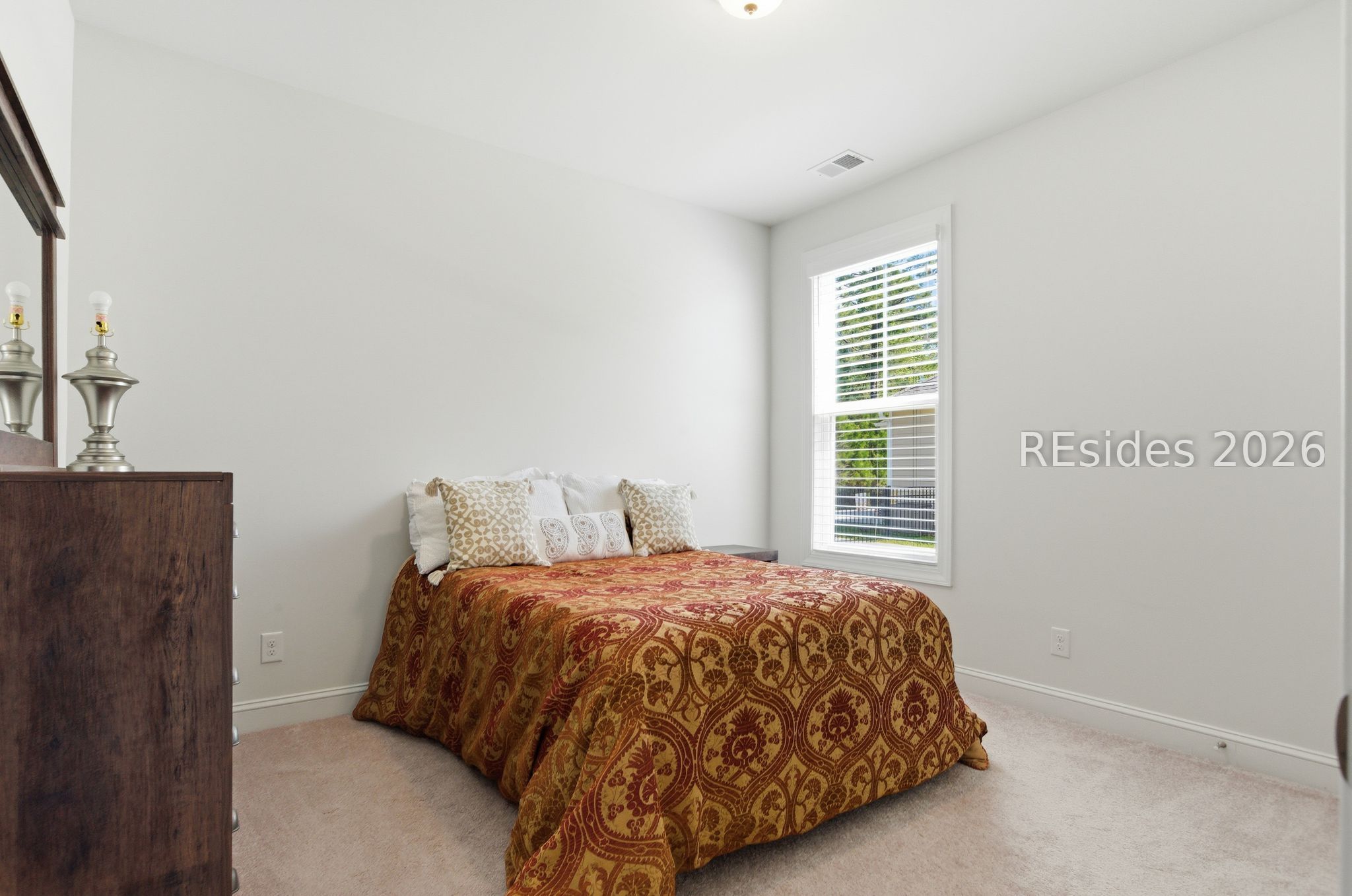 246 Lombards Mill Lane Bluffton, SC 29909 - Photo 22 of 33 Guest bedroom with carpet