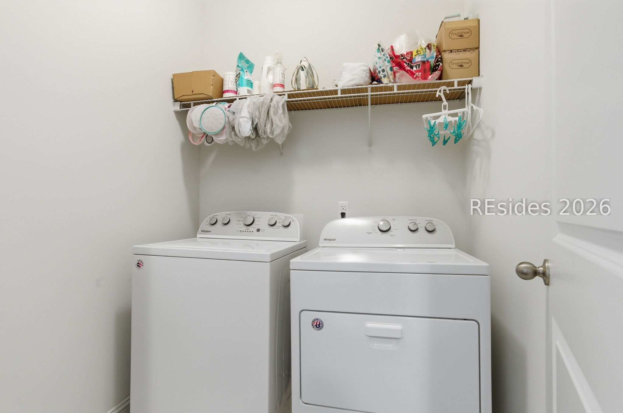 246 Lombards Mill Lane Bluffton, SC 29909 - Photo 26 of 33 Laundry with shelving