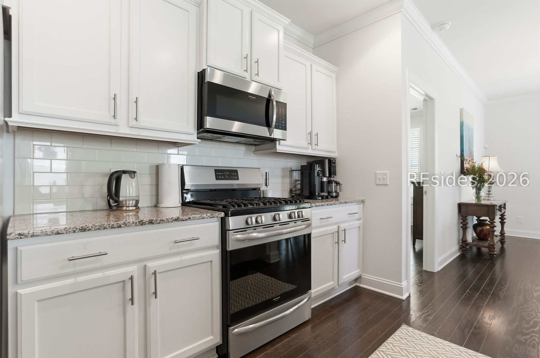 246 Lombards Mill Lane Bluffton, SC 29909 - Photo 9 of 33 Tasteful granite counters and custom backsplash.