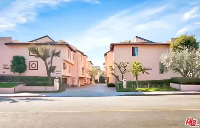 a street sign on a pole on a street