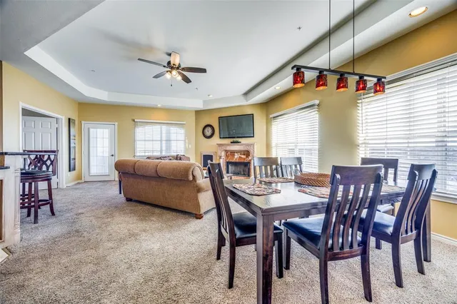 a view of a livingroom with furniture window and wooden floor