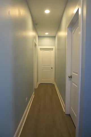 a view of hallway with shower