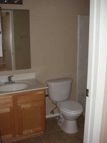 3511 East Baseline Road, Unit 1003 Phoenix, AZ 85042 - Photo 4 of 4 a bathroom with a toilet and a sink