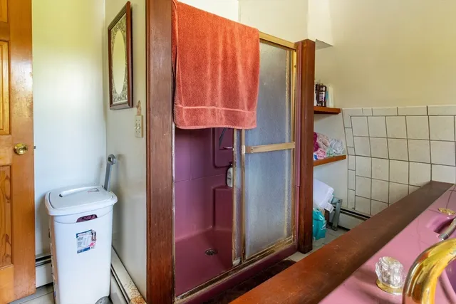 a bedroom with a bed and a closet