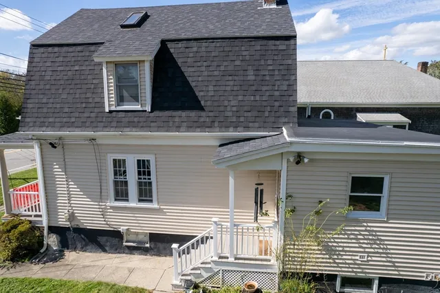 a front view of a house with a balcony