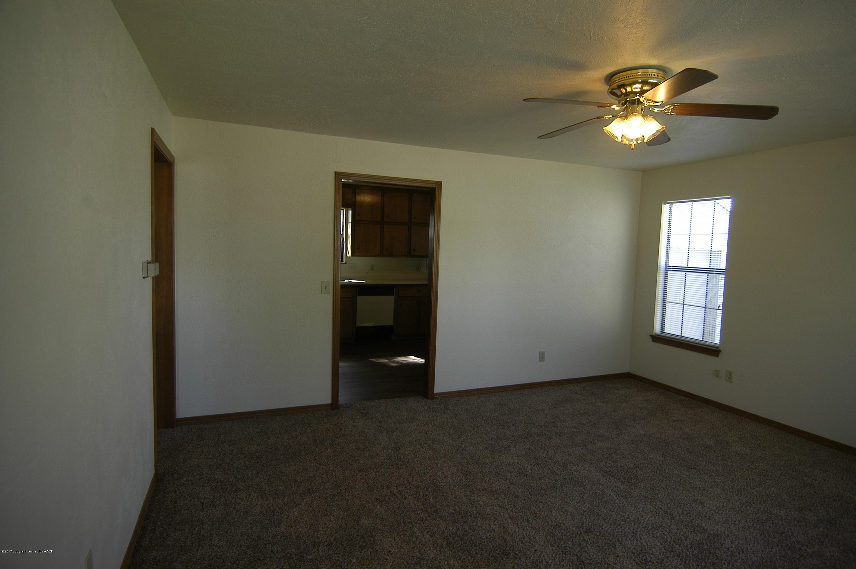 4108 South Hayden Street Amarillo, TX 79110 - Photo 3 of 11 Living Room to Kitchen