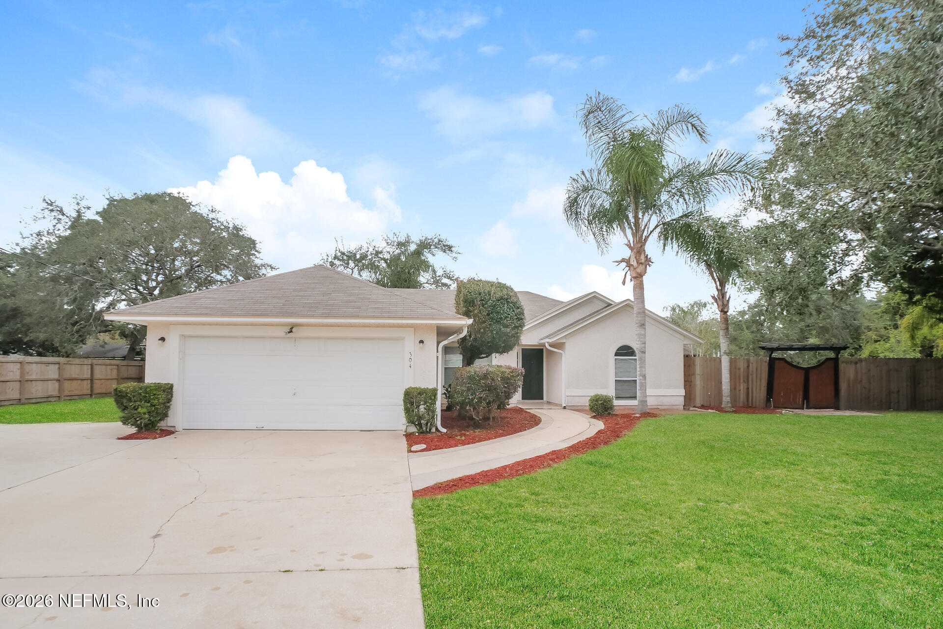 304 Segovia Road St. Augustine, FL 32086 - Photo 1 of 15 a front view of house with yard and green space