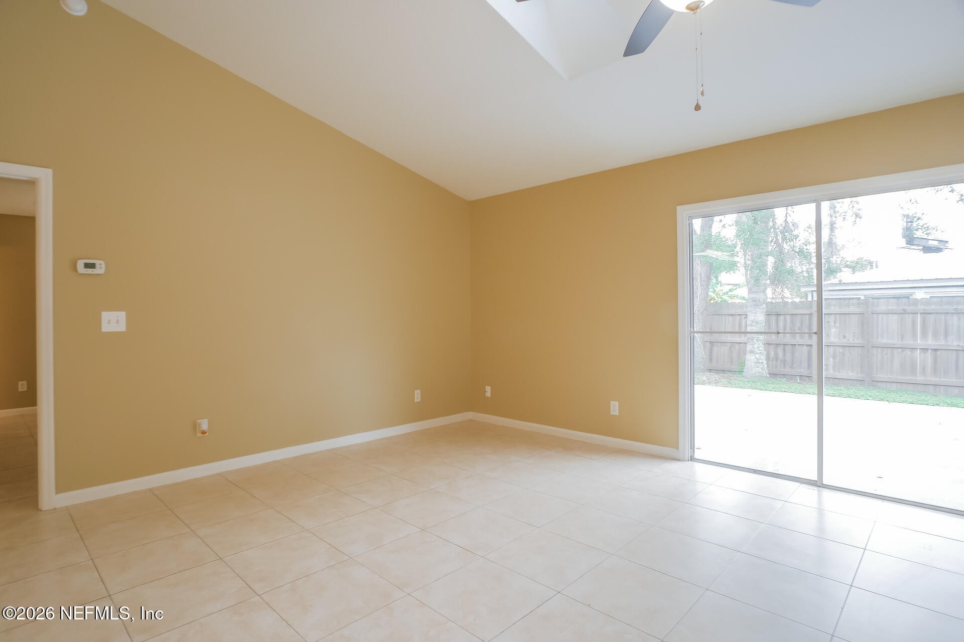 304 Segovia Road St. Augustine, FL 32086 - Photo 3 of 15 a view of an empty room with a window
