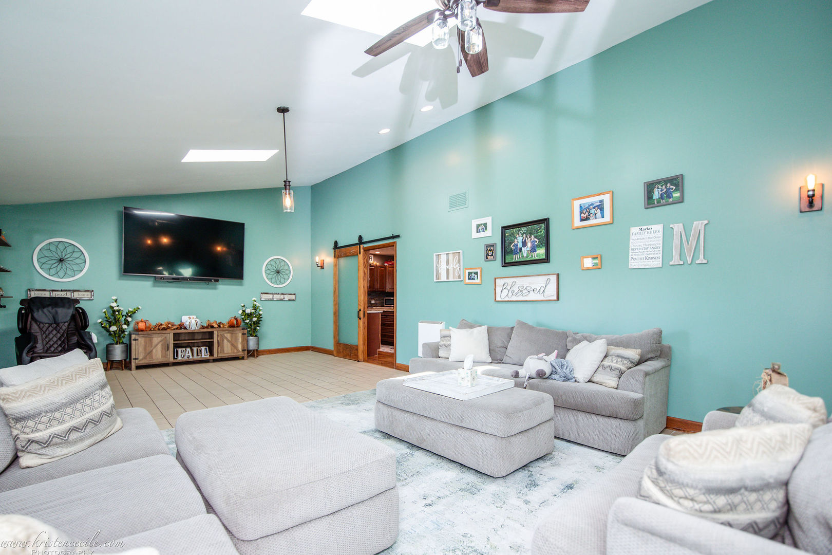 27243 South 88th Avenue Monee, IL 60449 - Photo 31 of 59 a living room with furniture and a flat screen tv