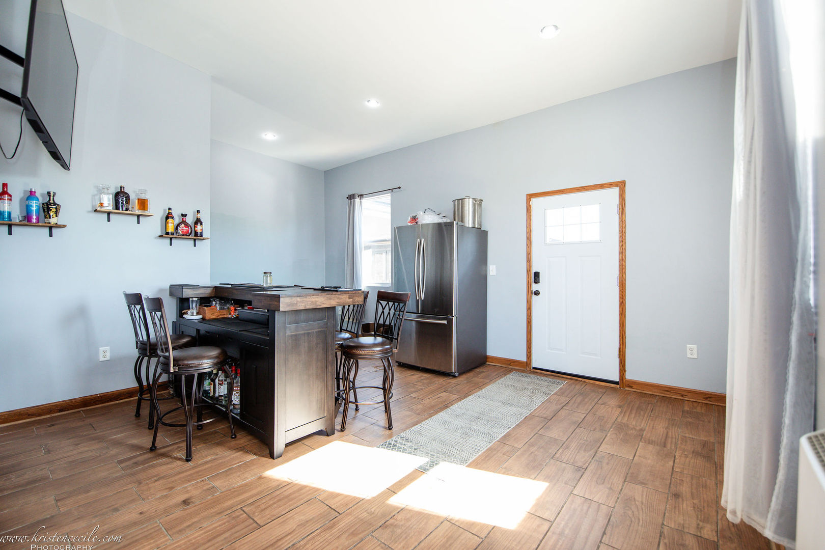 27243 South 88th Avenue Monee, IL 60449 - Photo 36 of 59 a view of a workspace with furniture and wooden floor