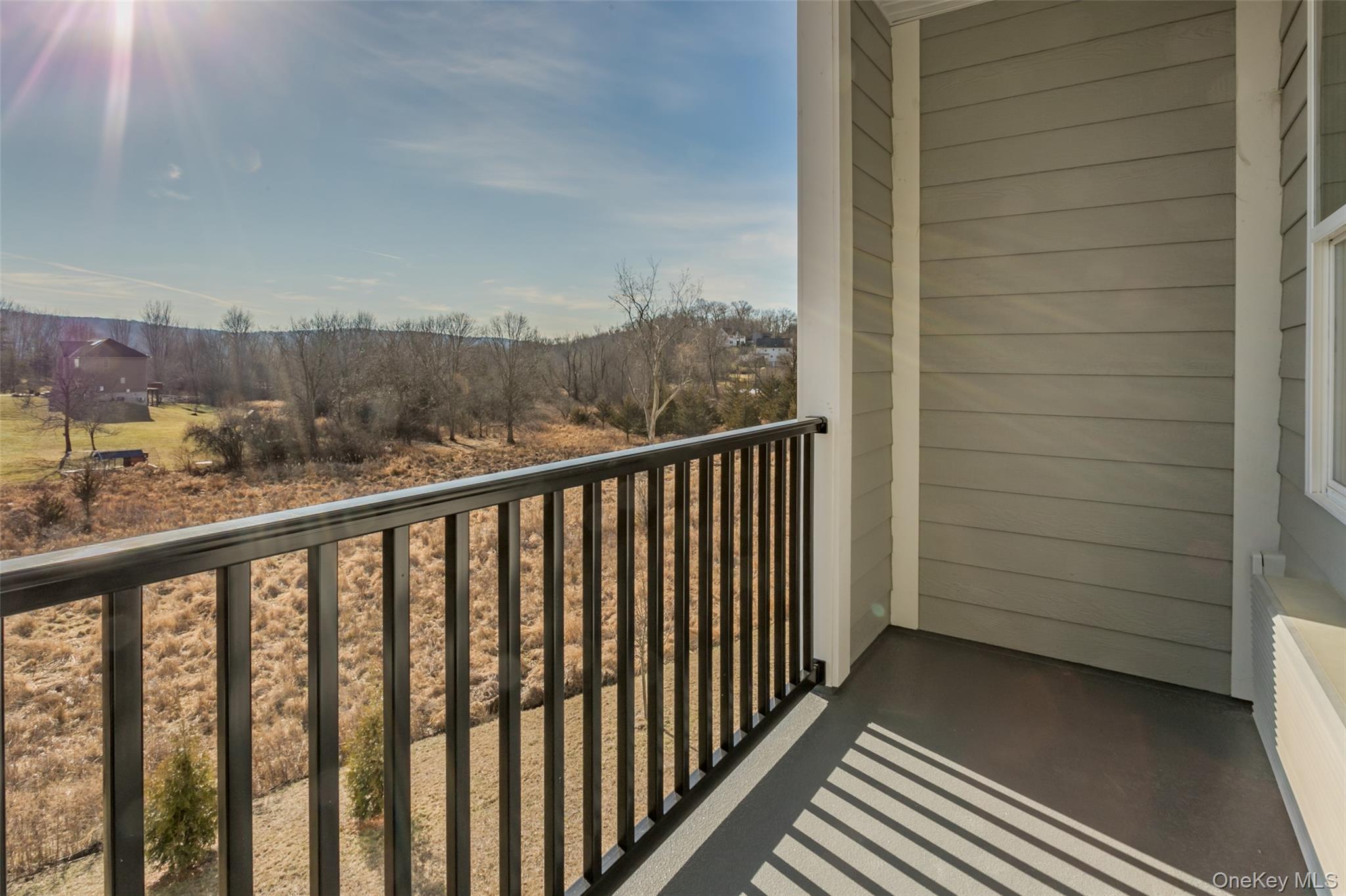124 South Main Street, Unit 2210 Florida, NY 10921 - Photo 12 of 14 a view of a balcony with an outdoor space