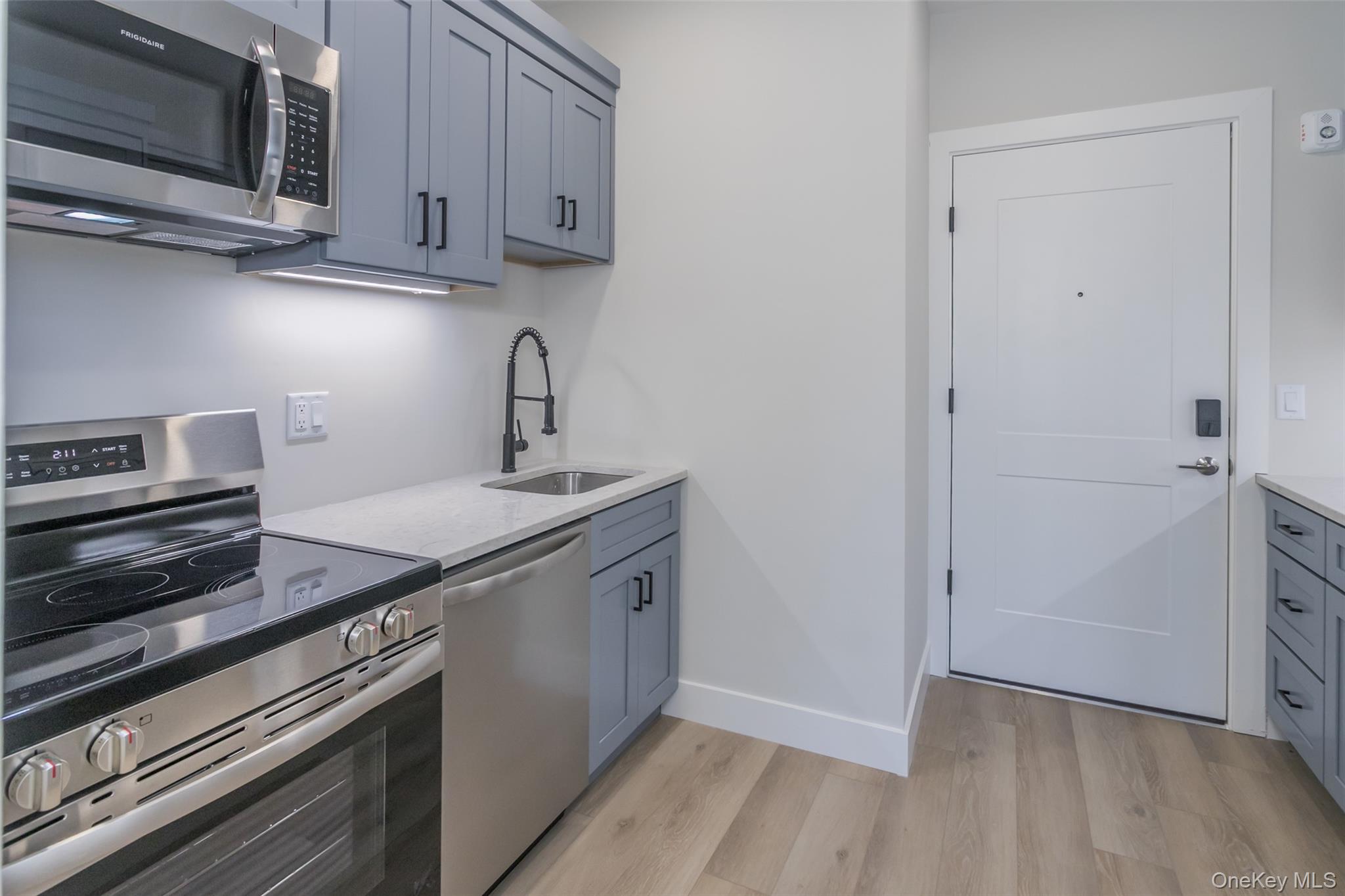 124 South Main Street, Unit 2210 Florida, NY 10921 - Photo 5 of 14 a kitchen with cabinets and steel stainless steel appliances