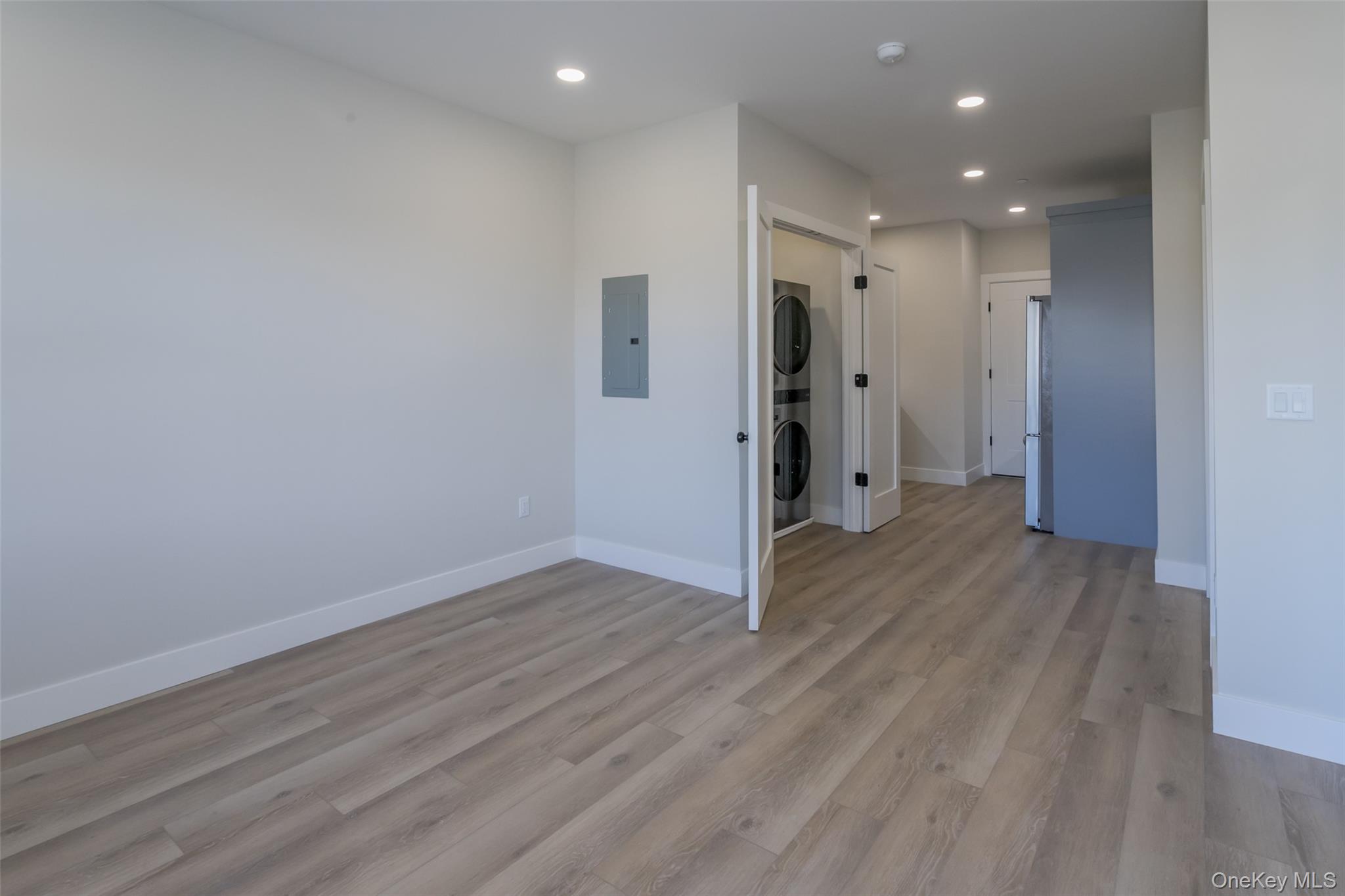 124 South Main Street, Unit 2210 Florida, NY 10921 - Photo 7 of 14 a view of a hallway with wooden floor